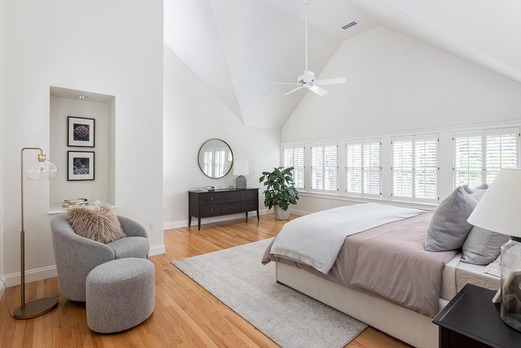 51 Rawson Road, Unit 51 Brookline, MA 02445 - Photo 14 of 23 a spacious bedroom with a bed couch and window