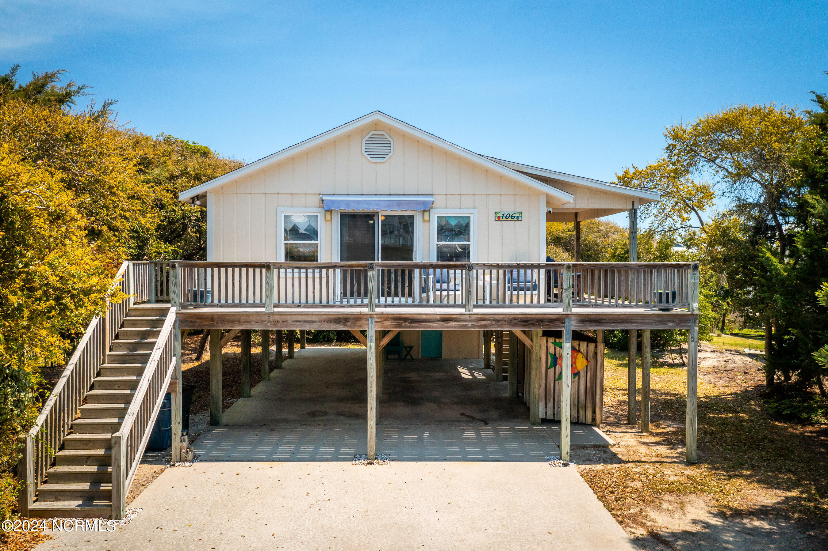 106 Robin Street Emerald Isle, NC 28594 - Photo 1 of 46 FRONT OF HOUSE