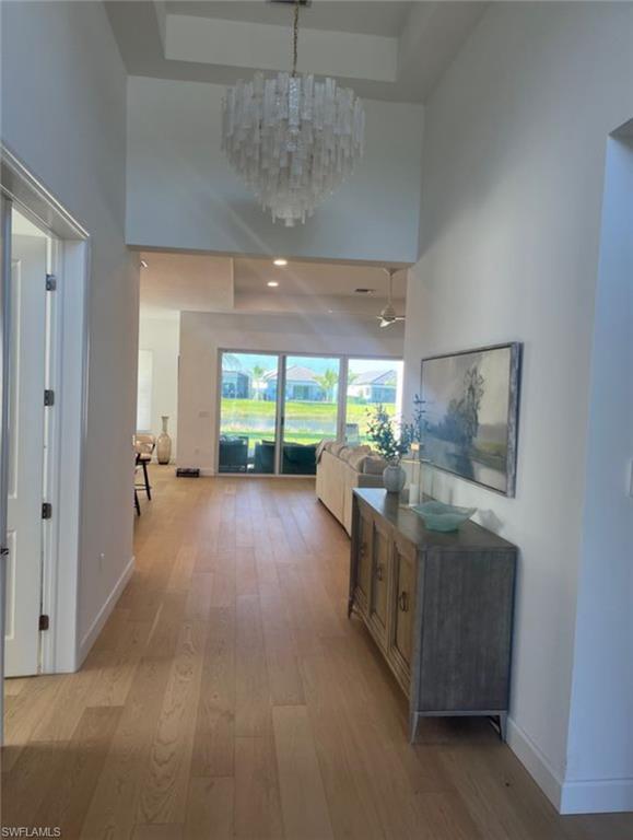 12181 Eucalyptus Way Naples, FL 34120 - Photo 10 of 13 a view of a furniture and a garage