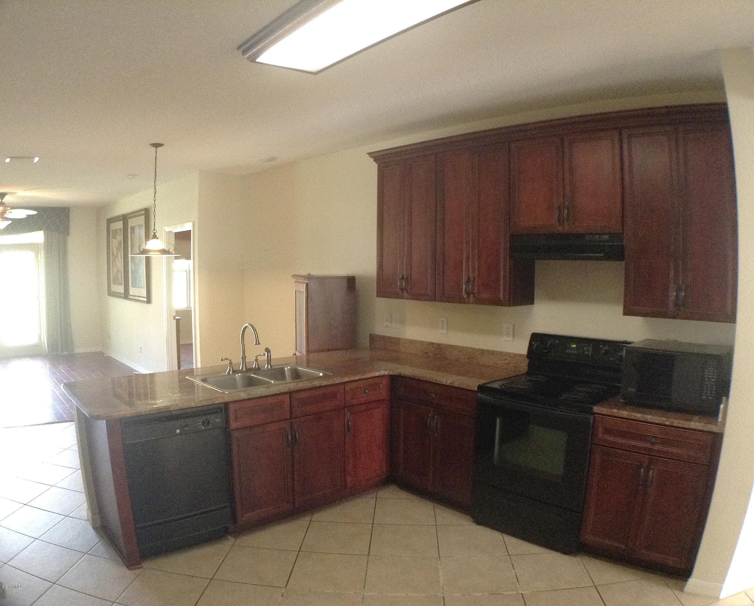 989 Riviera Point Drive Rockledge, FL 32955 - Photo 13 of 25 Kitchen View