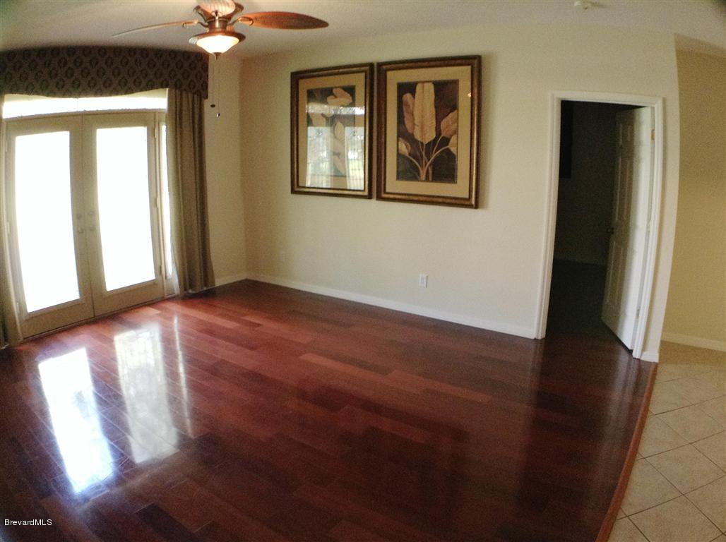 989 Riviera Point Drive Rockledge, FL 32955 - Photo 15 of 25 Family Room