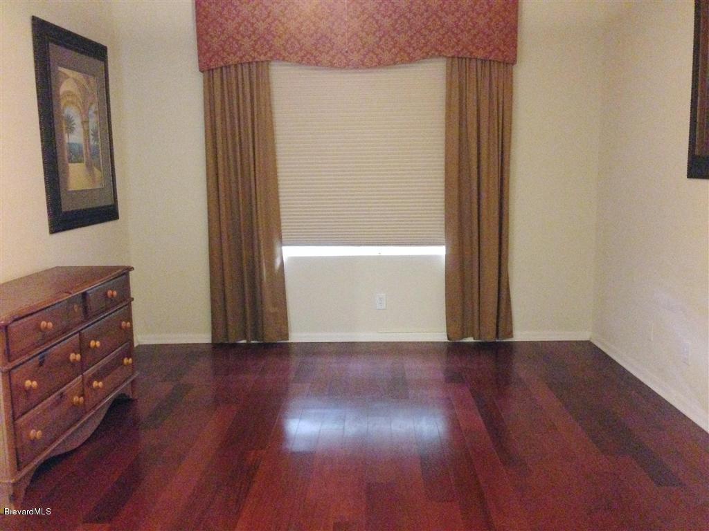 989 Riviera Point Drive Rockledge, FL 32955 - Photo 20 of 25 Master Bedroom