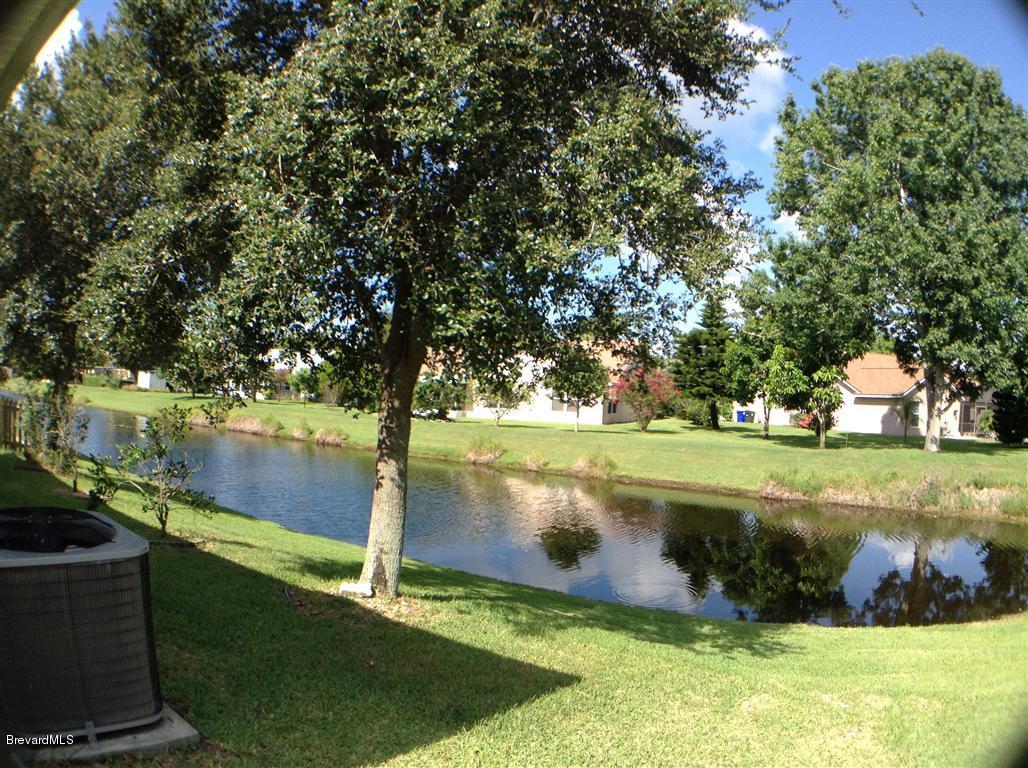 989 Riviera Point Drive Rockledge, FL 32955 - Photo 6 of 25 Backyard View 1