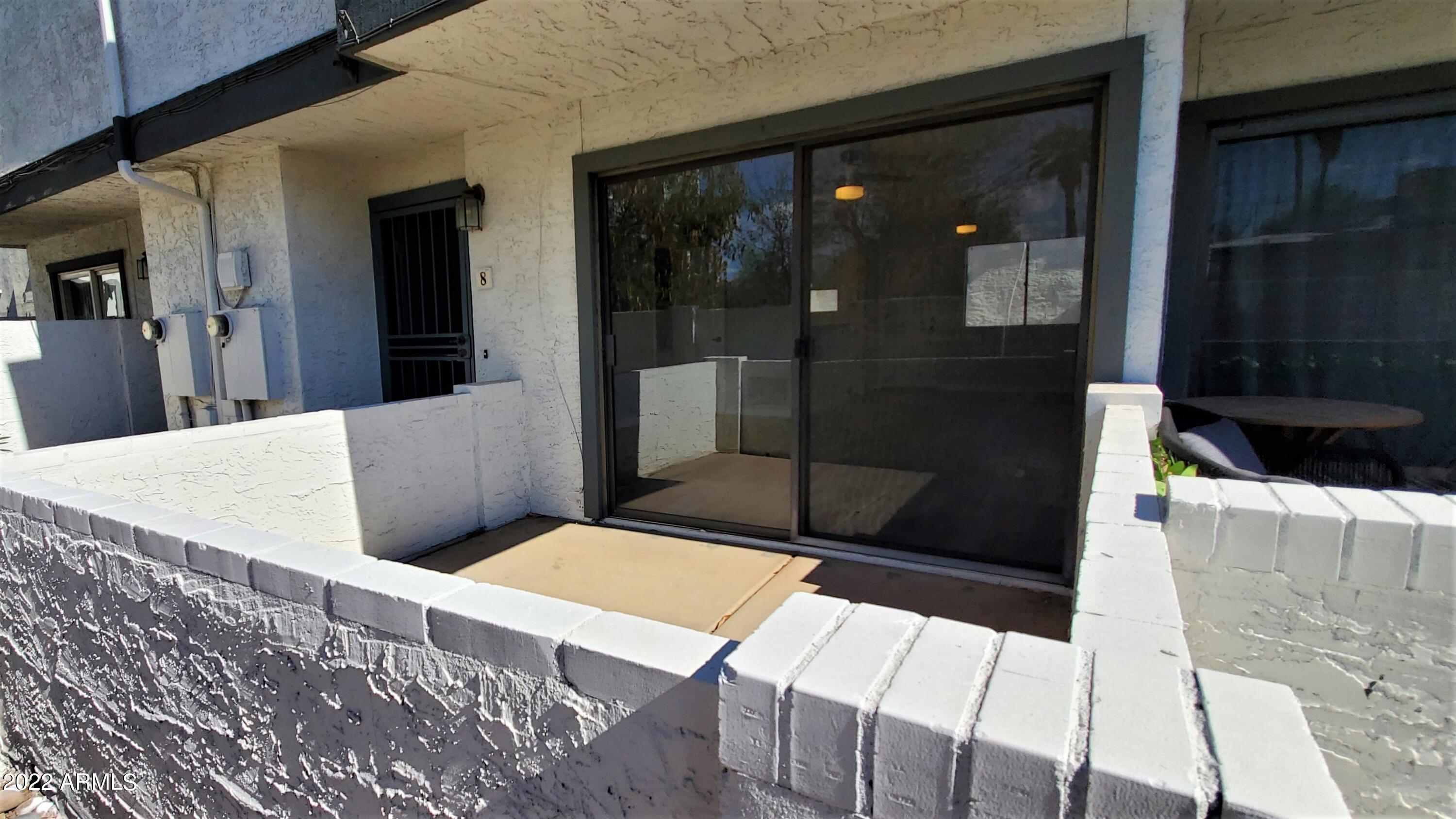 3411 North 12th Place, Unit 8 Phoenix, AZ 85014 - Photo 37 of 41 a balcony view with a glass door