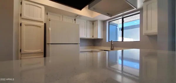 a view of walk in closet with window