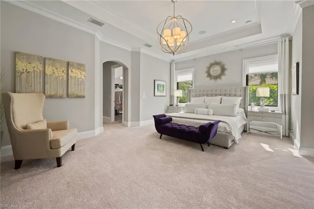 a bedroom with bed and window