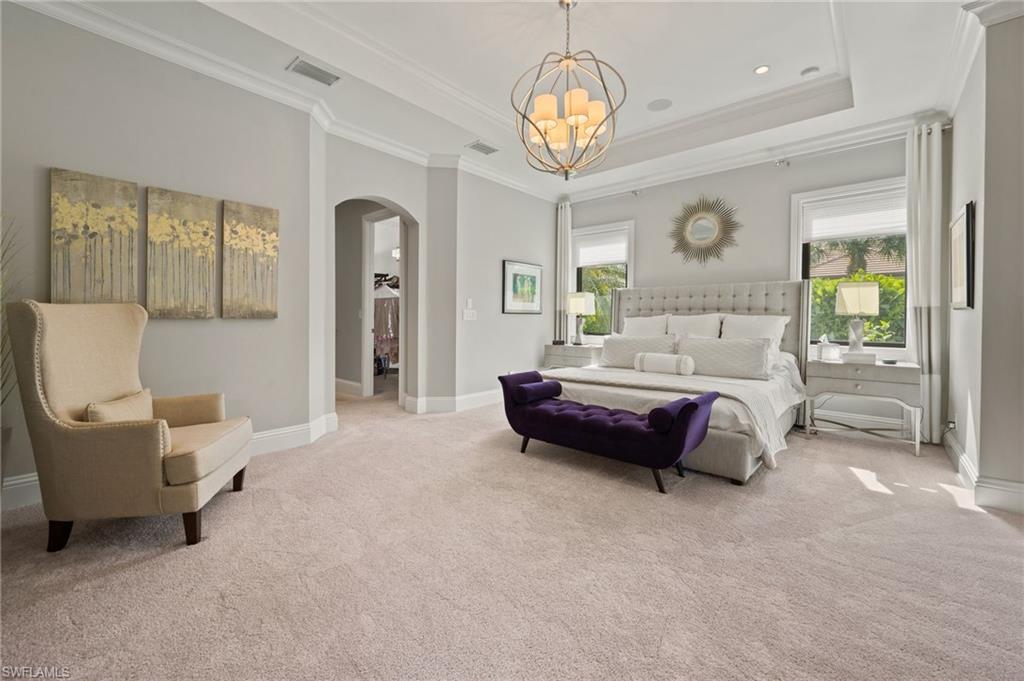 6363 Burnham Road Naples, FL 34119 - Photo 17 of 38 a bedroom with bed and window