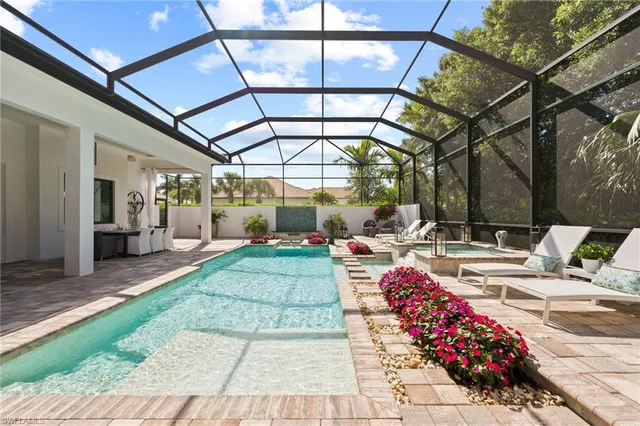 a view of a chairs and tables in the patio