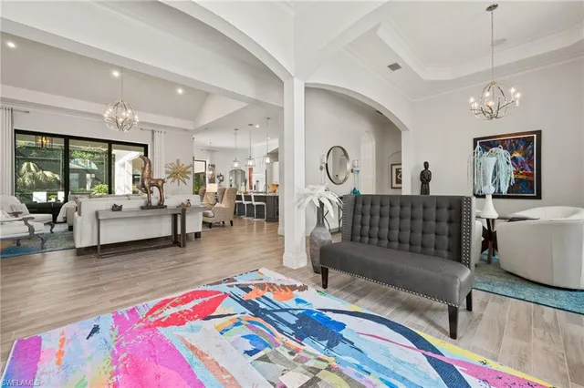 a living room with furniture and a rug