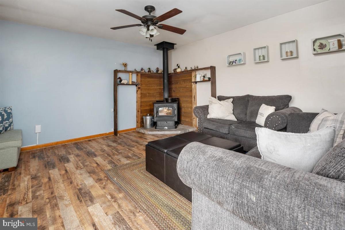 333 Ruthsburg Road Centreville, MD 21617 - Photo 13 of 43 Family Room off of Kitchen with Wood Burning Stove