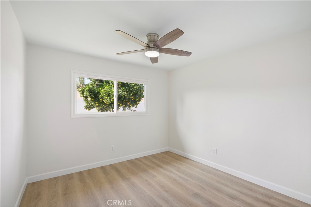 3670 Upper Terrace Drive Riverside, CA 92505 - Photo 14 of 30 an empty room with a window and a fan