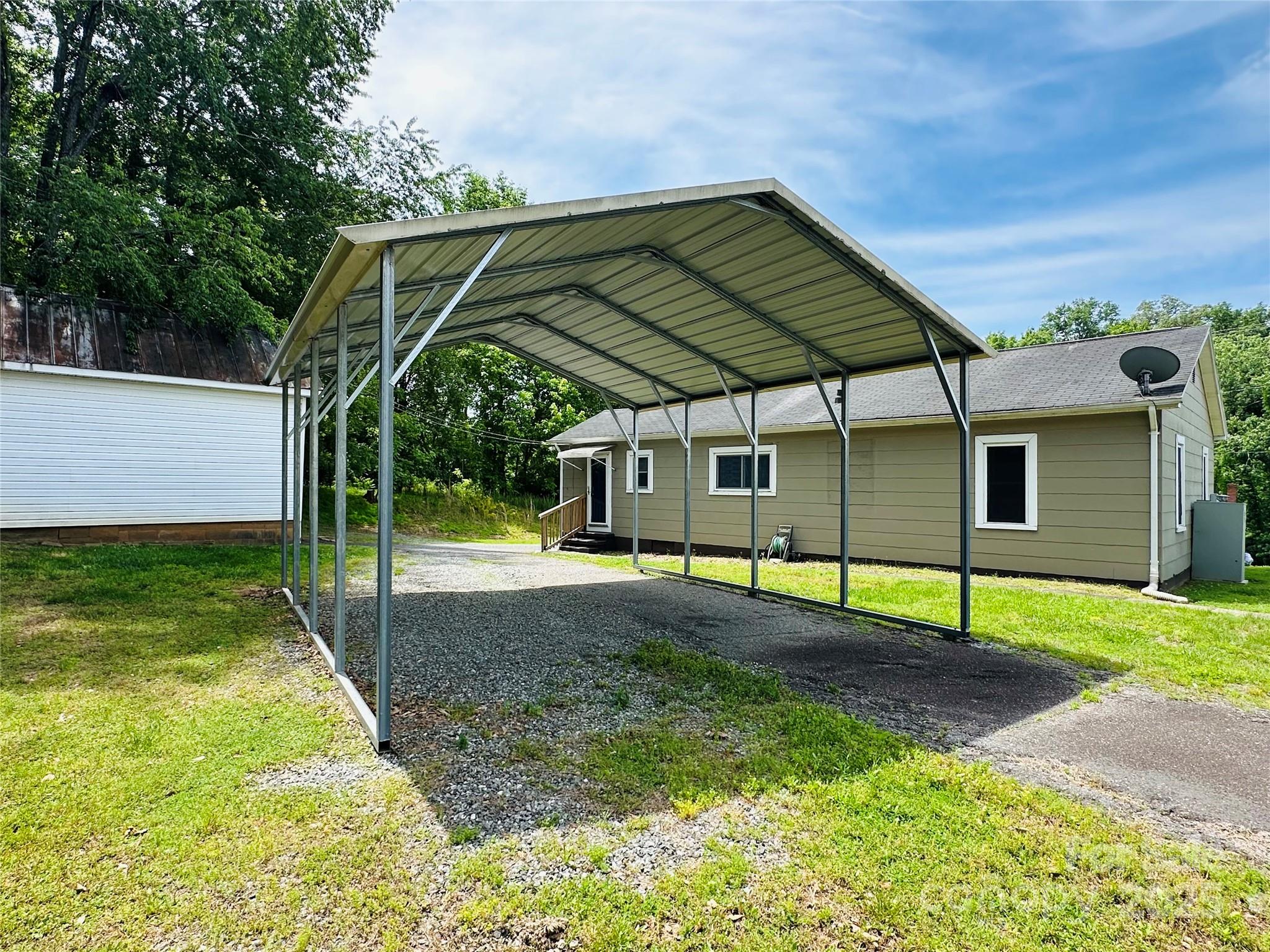 421 Bethel Road Morganton, NC 28655 - Photo 15 of 40 a view of a house with backyard and a backyard