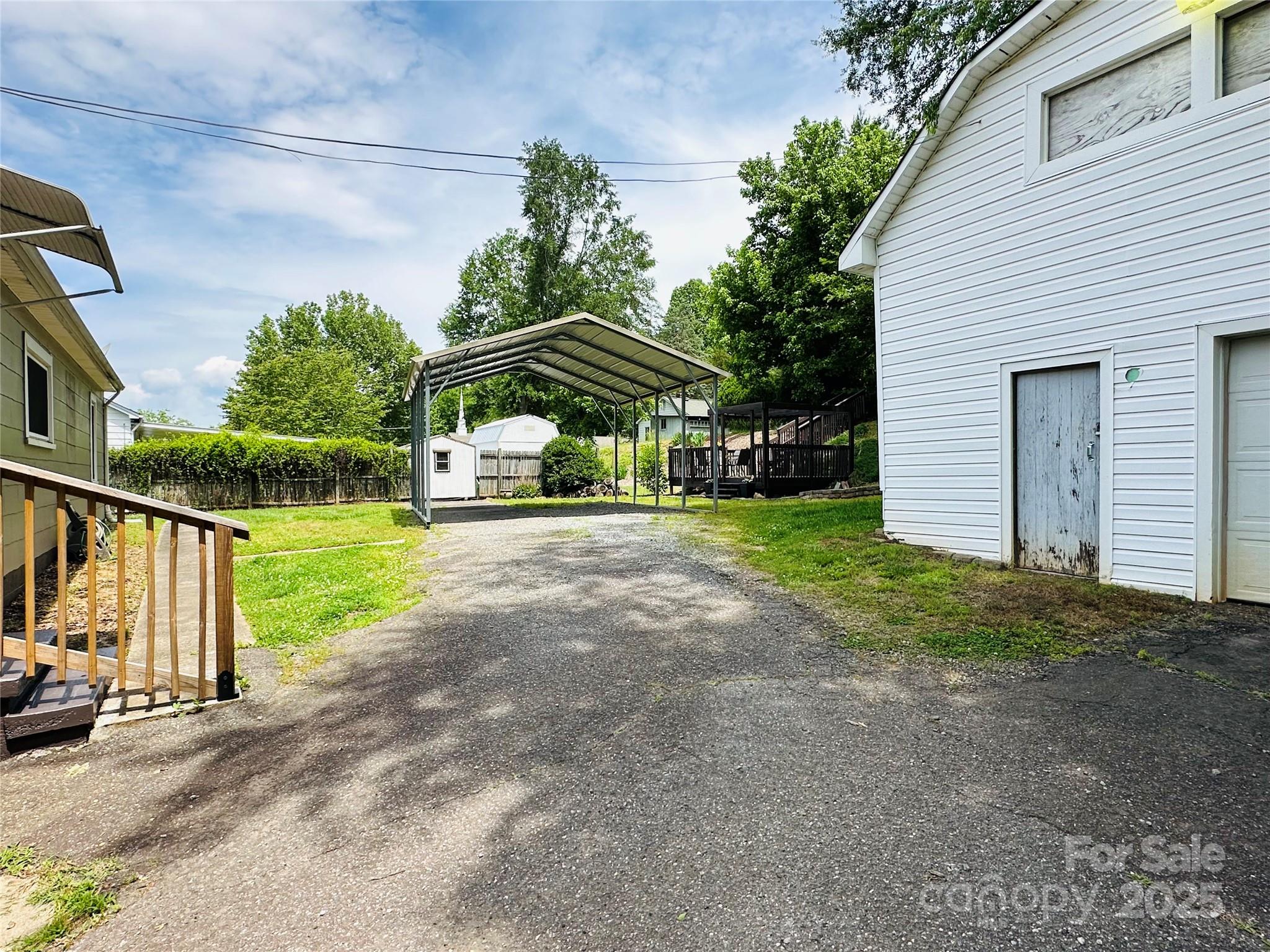 421 Bethel Road Morganton, NC 28655 - Photo 16 of 40 a front view of a house with garden