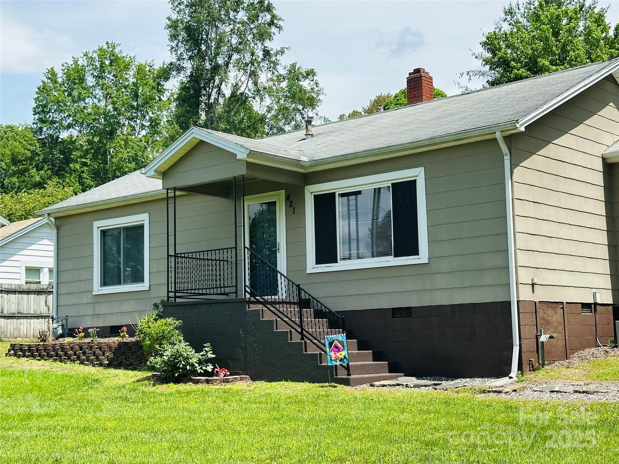 421 Bethel Road Morganton, NC 28655 - Photo 17 of 40 a view of a house with a yard