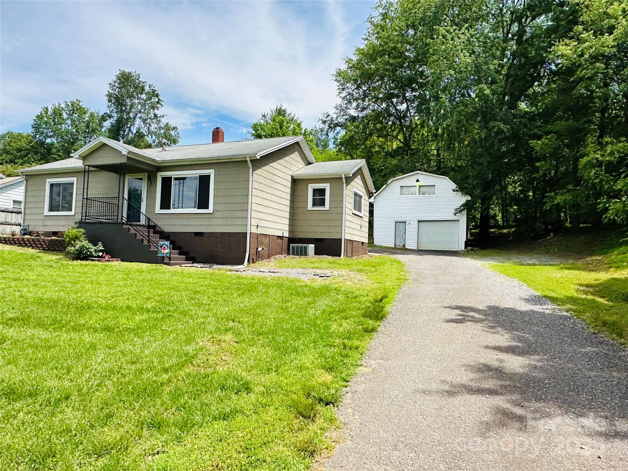 421 Bethel Road Morganton, NC 28655 - Photo 18 of 40 a house view with a garden space