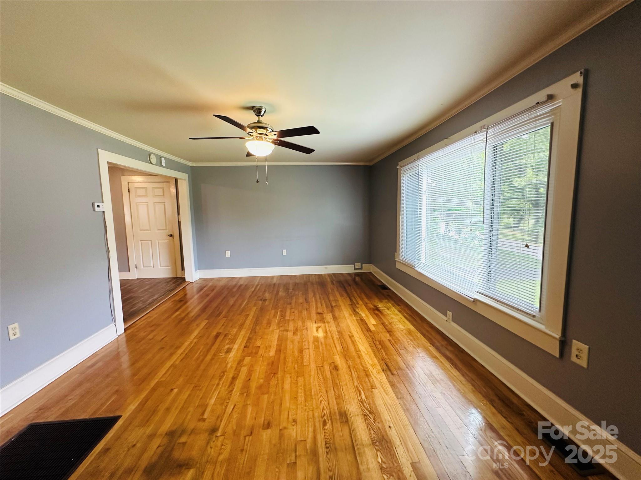 421 Bethel Road Morganton, NC 28655 - Photo 19 of 40 wooden floor in an empty room with a window