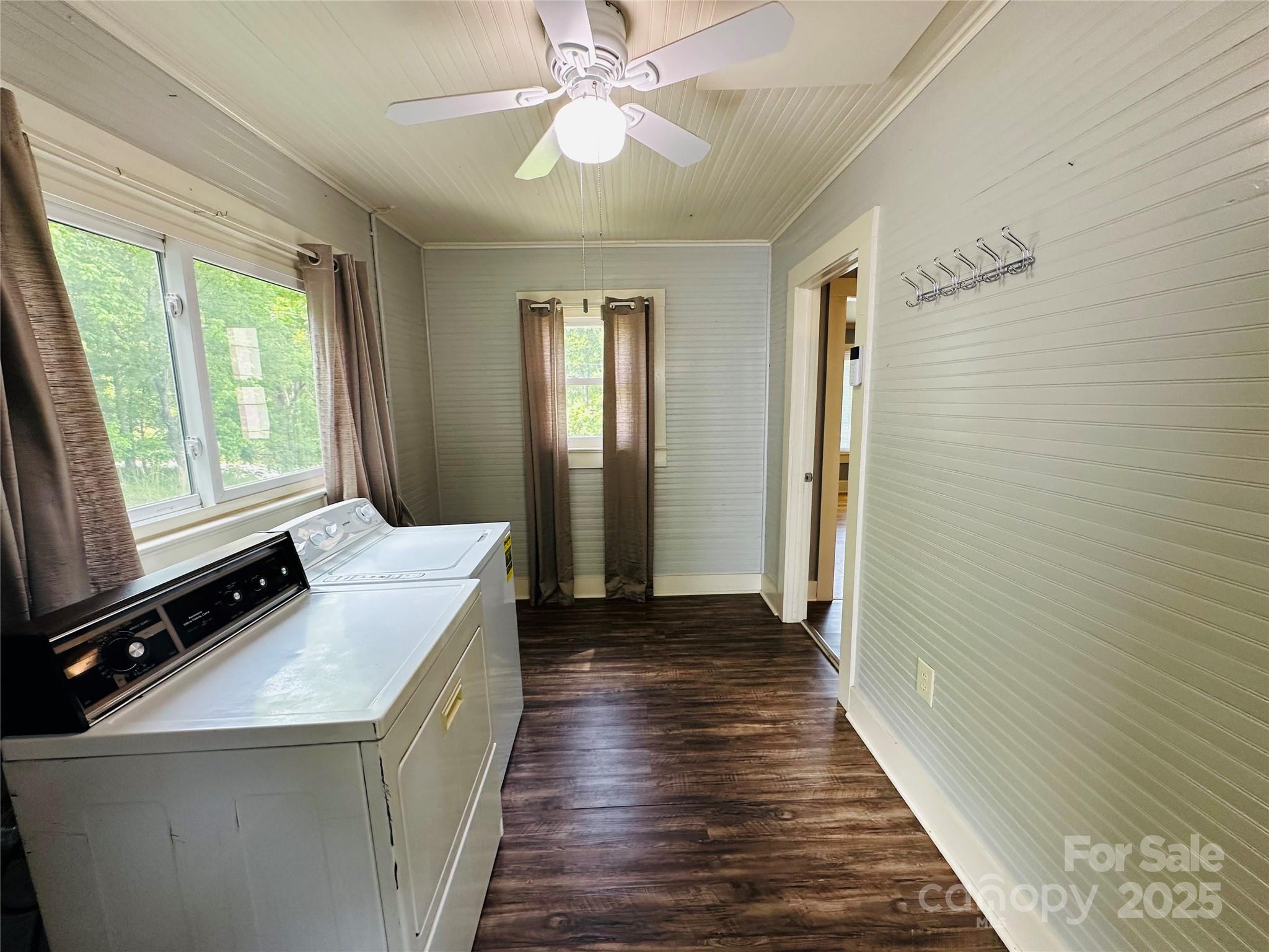 421 Bethel Road Morganton, NC 28655 - Photo 32 of 40 a view of a hallway with wooden floor and chandelier