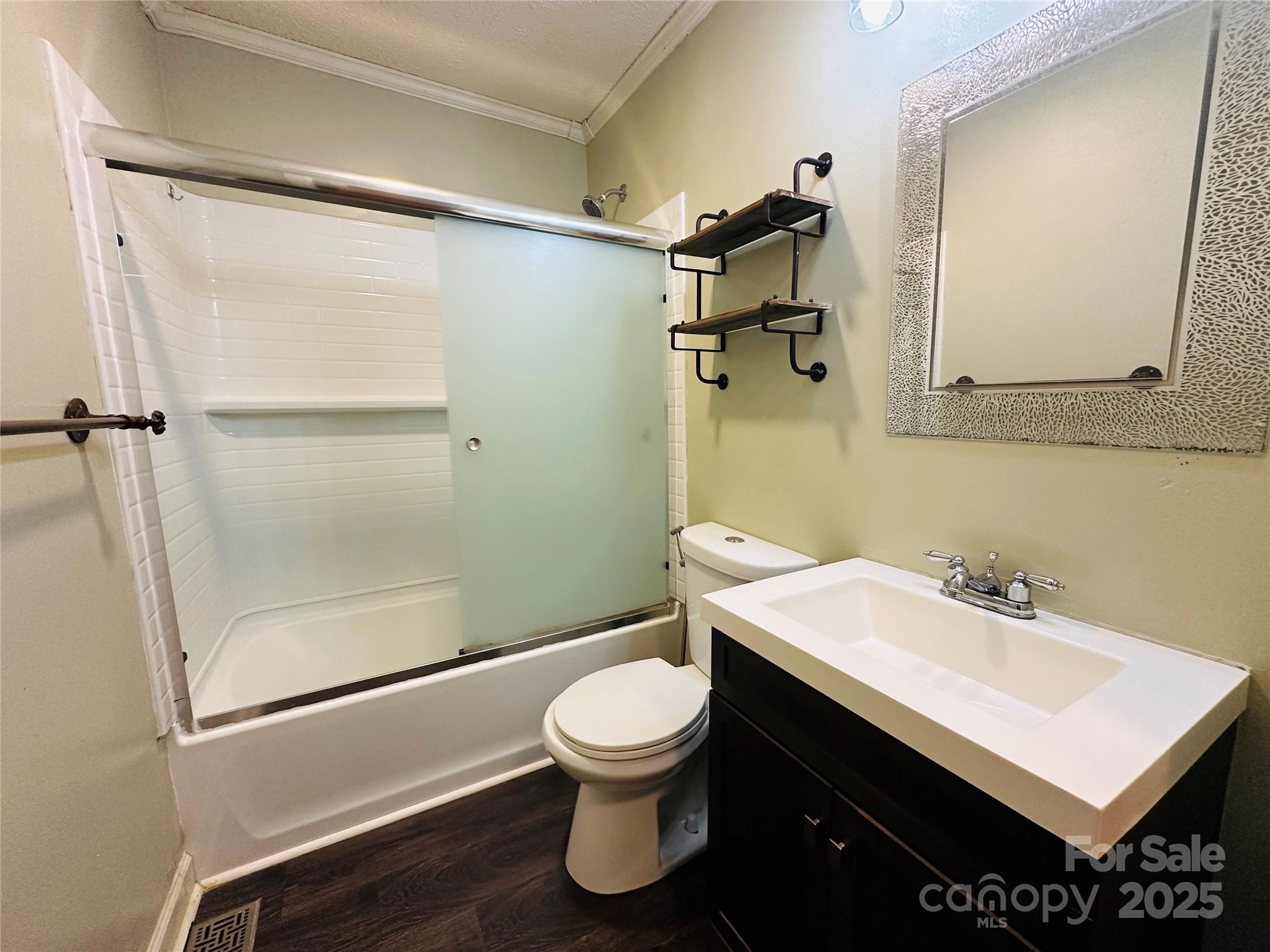 421 Bethel Road Morganton, NC 28655 - Photo 37 of 40 a bathroom with a sink toilet and shower