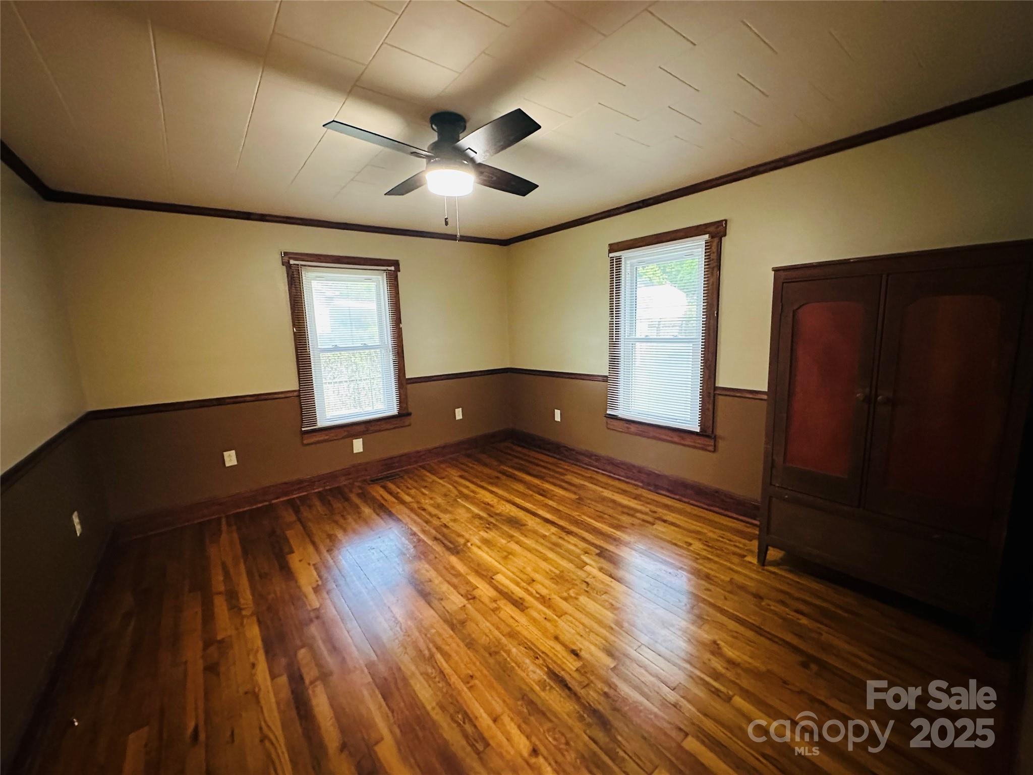 421 Bethel Road Morganton, NC 28655 - Photo 40 of 40 an empty room with wooden floor and windows