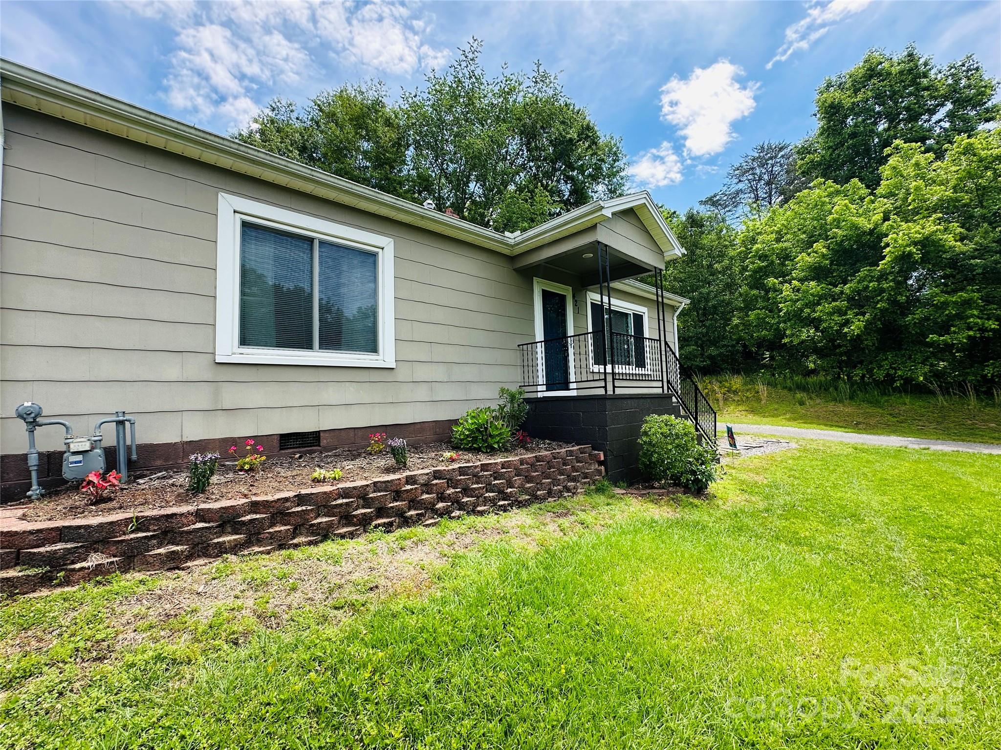 421 Bethel Road Morganton, NC 28655 - Photo 6 of 40 a backyard of a house with lots of green space