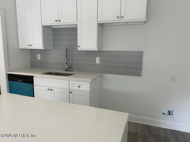 9727 Tiffany Avenue Jacksonville, FL 32246 - Photo 12 of 19 a kitchen with white cabinets and a sink