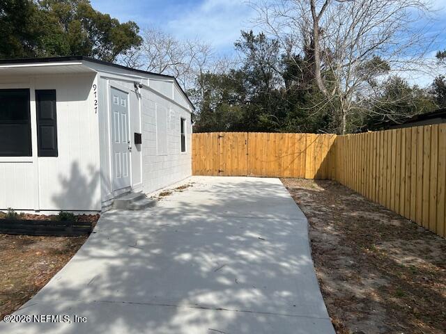 9727 Tiffany Avenue Jacksonville, FL 32246 - Photo 4 of 19 a view of a back yard of the house