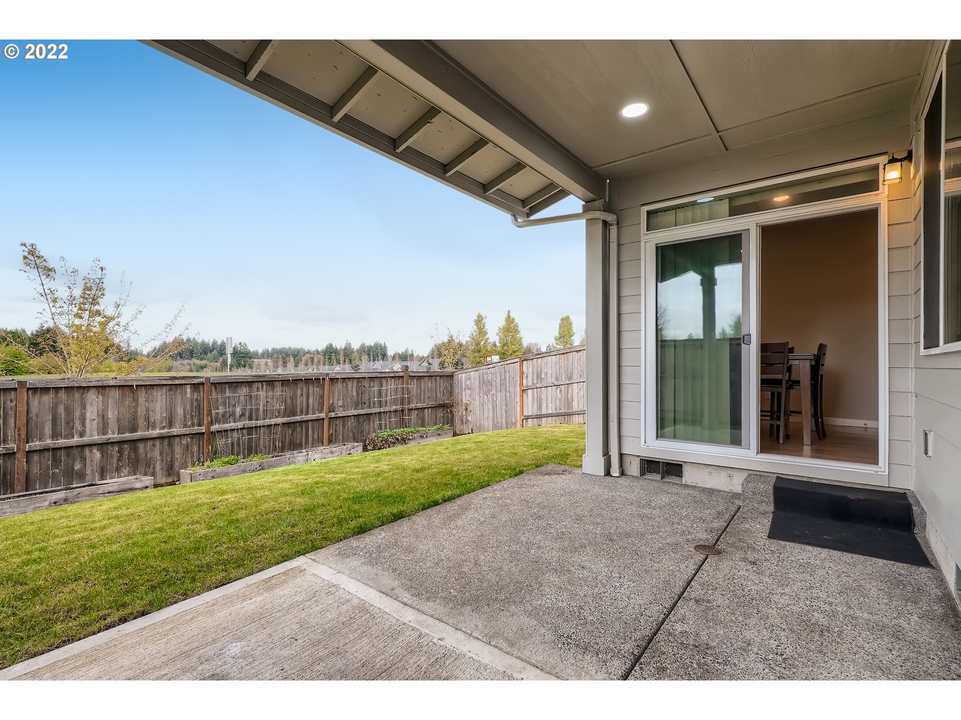 1416 Northeast 172nd Street Ridgefield, WA 98642 - Photo 27 of 28 a view of a porch with a yard