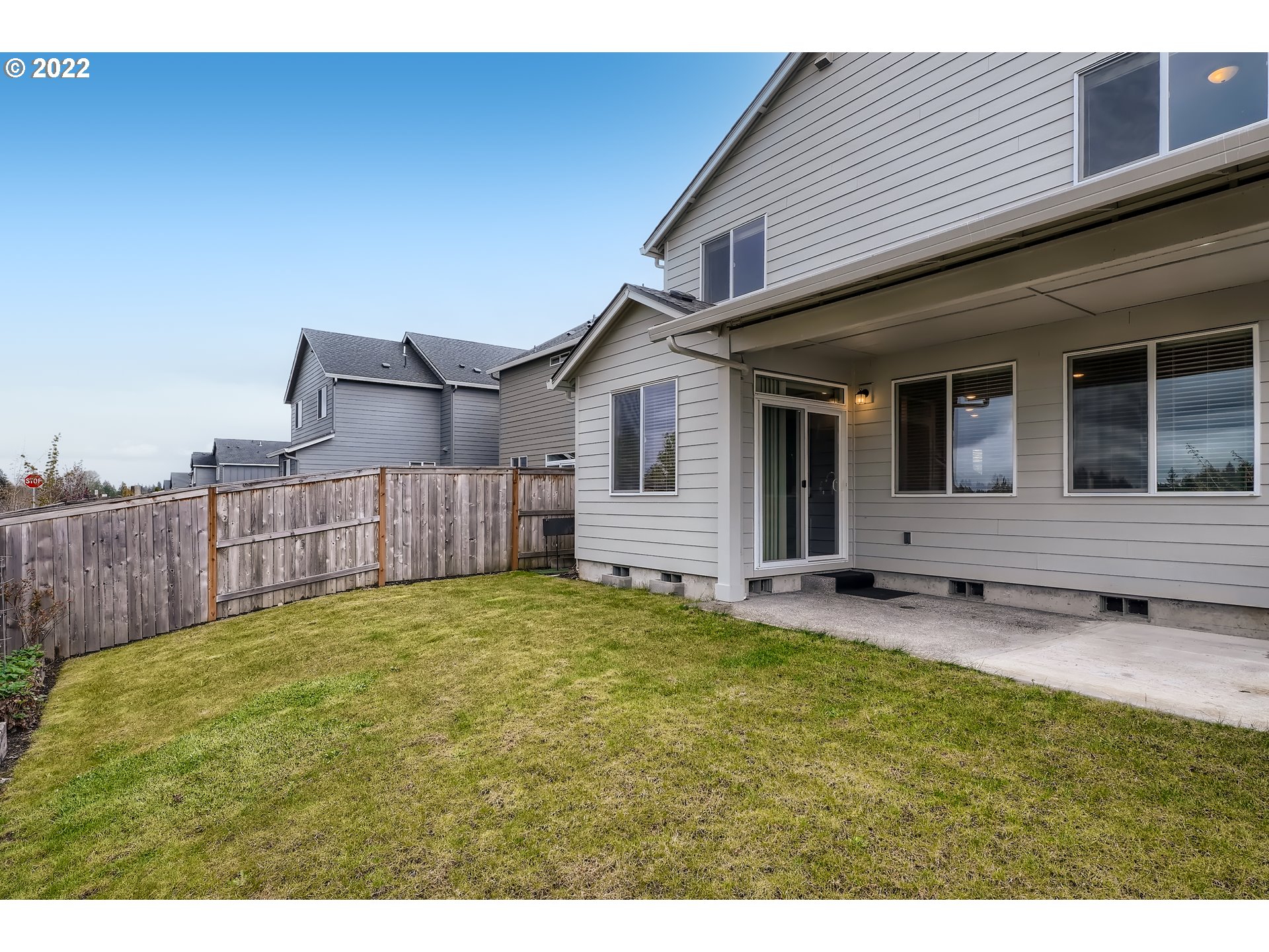 1416 Northeast 172nd Street Ridgefield, WA 98642 - Photo 28 of 28 a view of a house with backyard and wooden fence