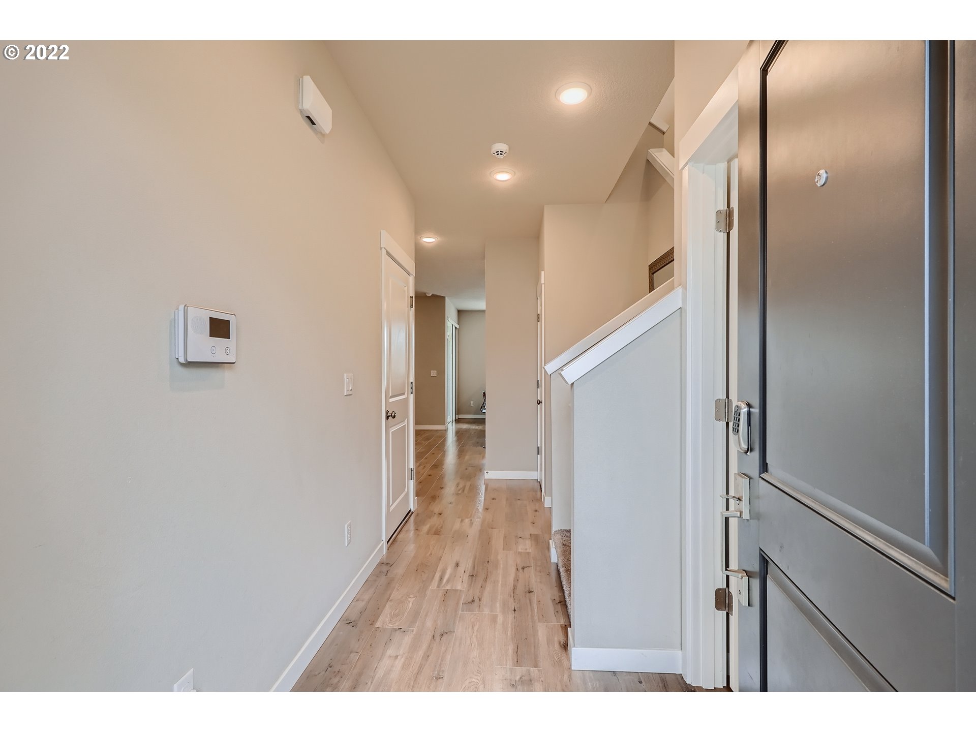 1416 Northeast 172nd Street Ridgefield, WA 98642 - Photo 4 of 28 a view of hallway with wooden floor