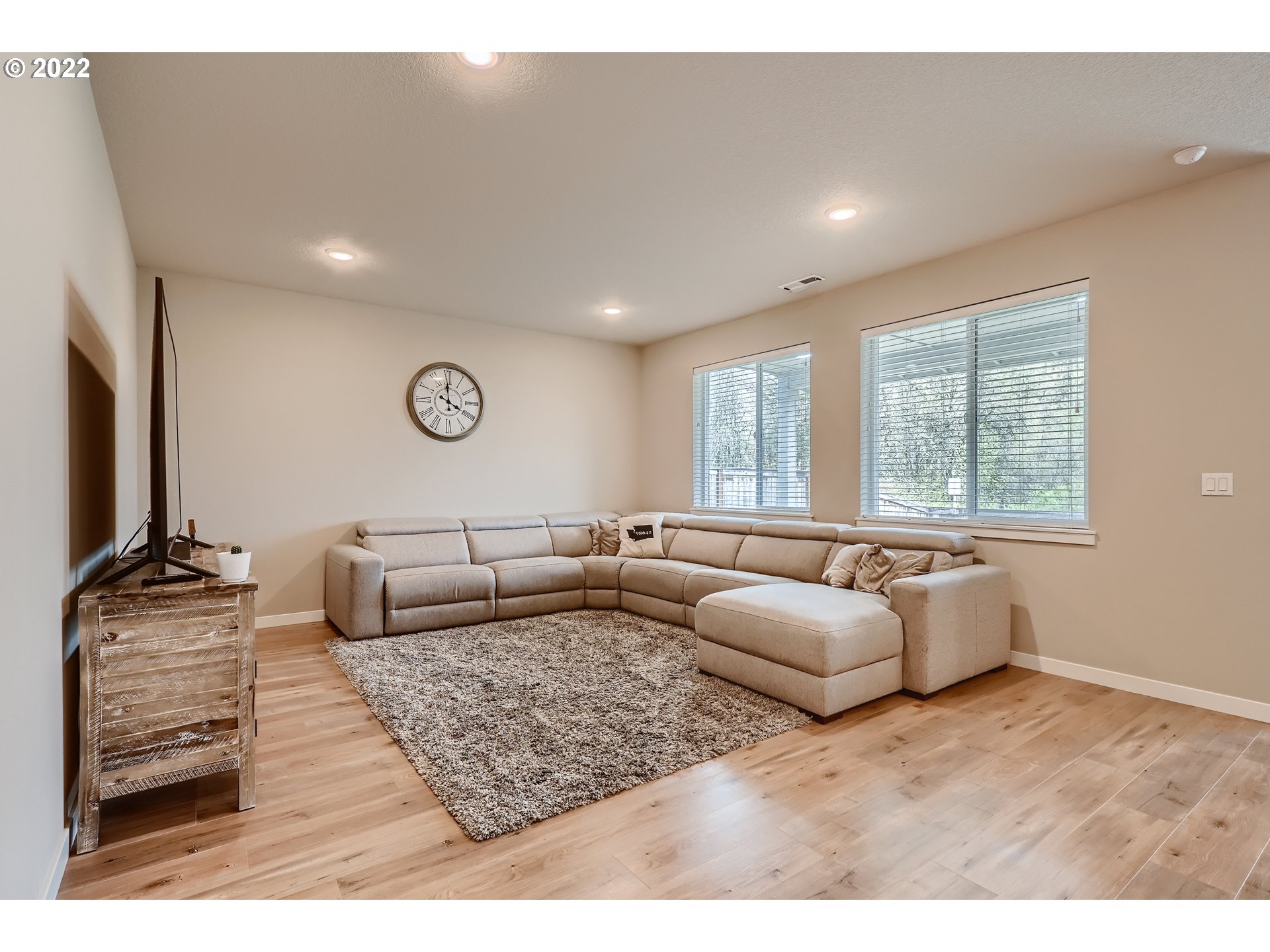 1416 Northeast 172nd Street Ridgefield, WA 98642 - Photo 6 of 28 a living room with furniture and a flat screen tv