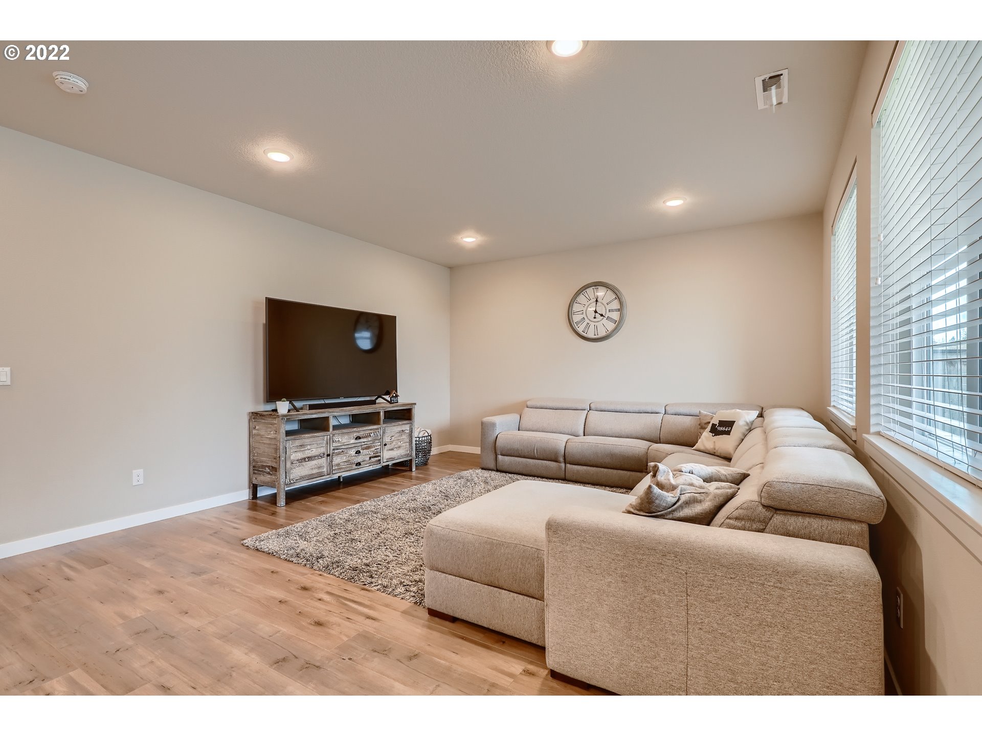 1416 Northeast 172nd Street Ridgefield, WA 98642 - Photo 7 of 28 a living room with furniture and a flat screen tv