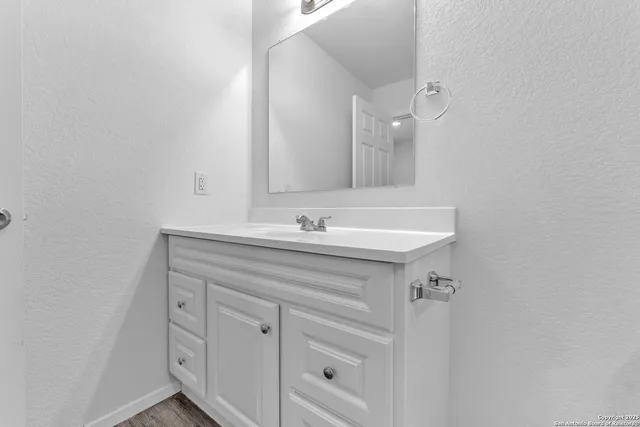 a sink with a mirror