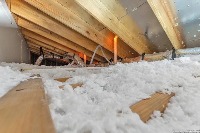 a view of snow on the road