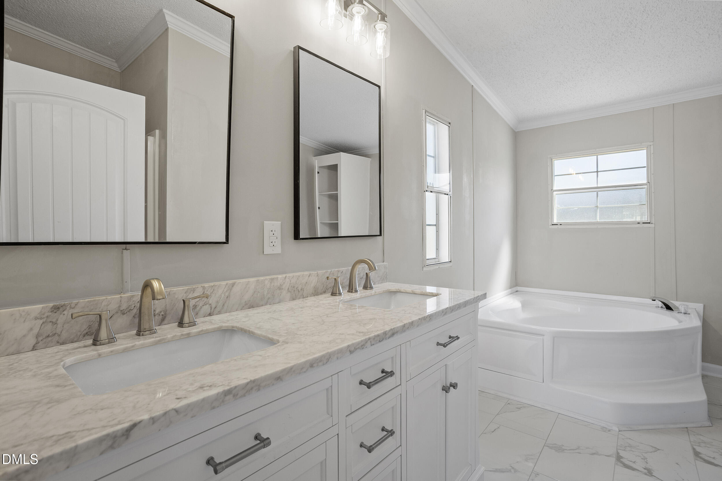 10965 Beaver Dam Road Middlesex, NC 27557 - Photo 7 of 24 a bathroom with a sink and a mirror