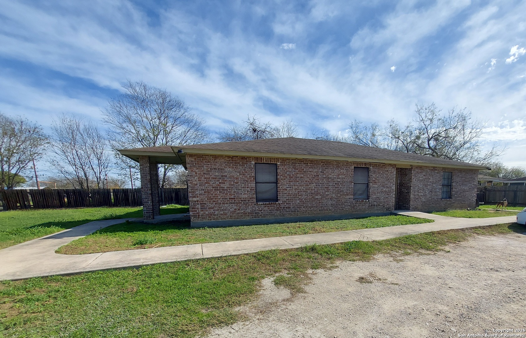 9510 Cross Rdg Lane San Antonio, TX 78263 - Photo 29 of 30 a view of a house with a yard and large tree