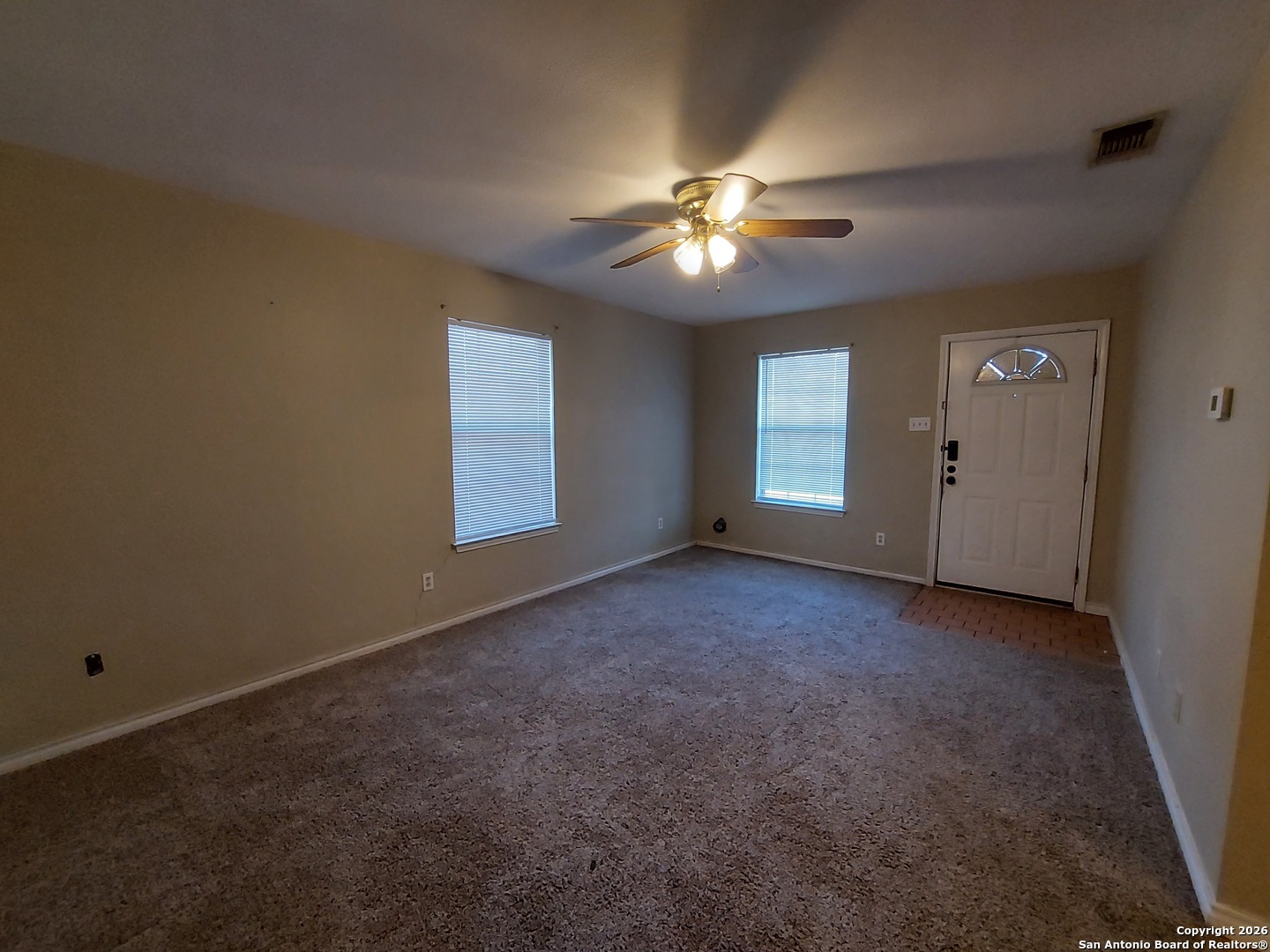 9510 Cross Rdg Lane San Antonio, TX 78263 - Photo 4 of 30 a view of an empty room with a window