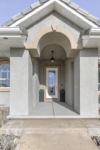 a front view of a house with a garage