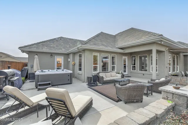 a view of living room filled with furniture and rug
