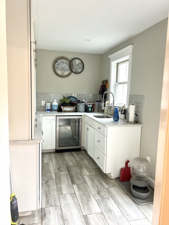 879 Long Pond Road Plymouth, MA 02360 - Photo 13 of 39 a kitchen with a sink cabinets and window