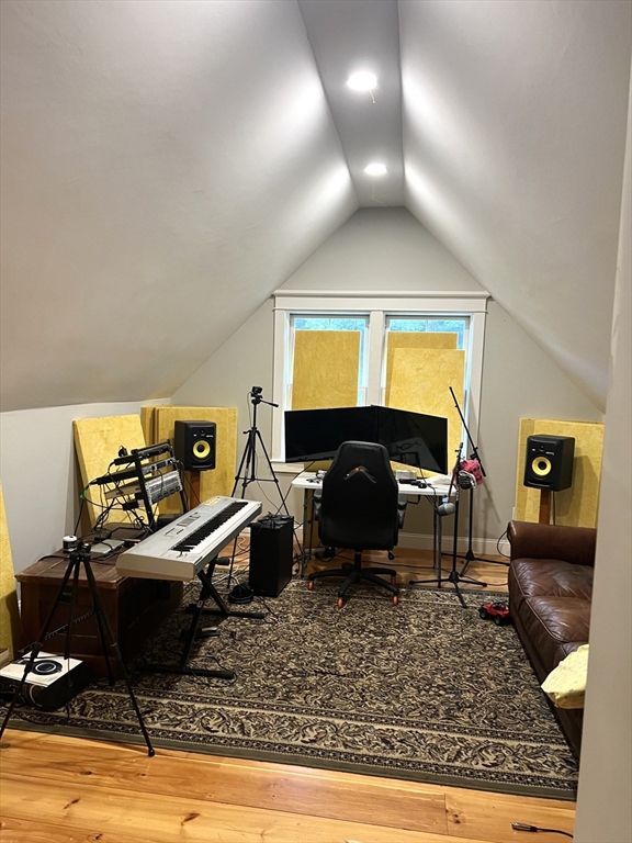 879 Long Pond Road Plymouth, MA 02360 - Photo 18 of 39 a living room with furniture and a fireplace