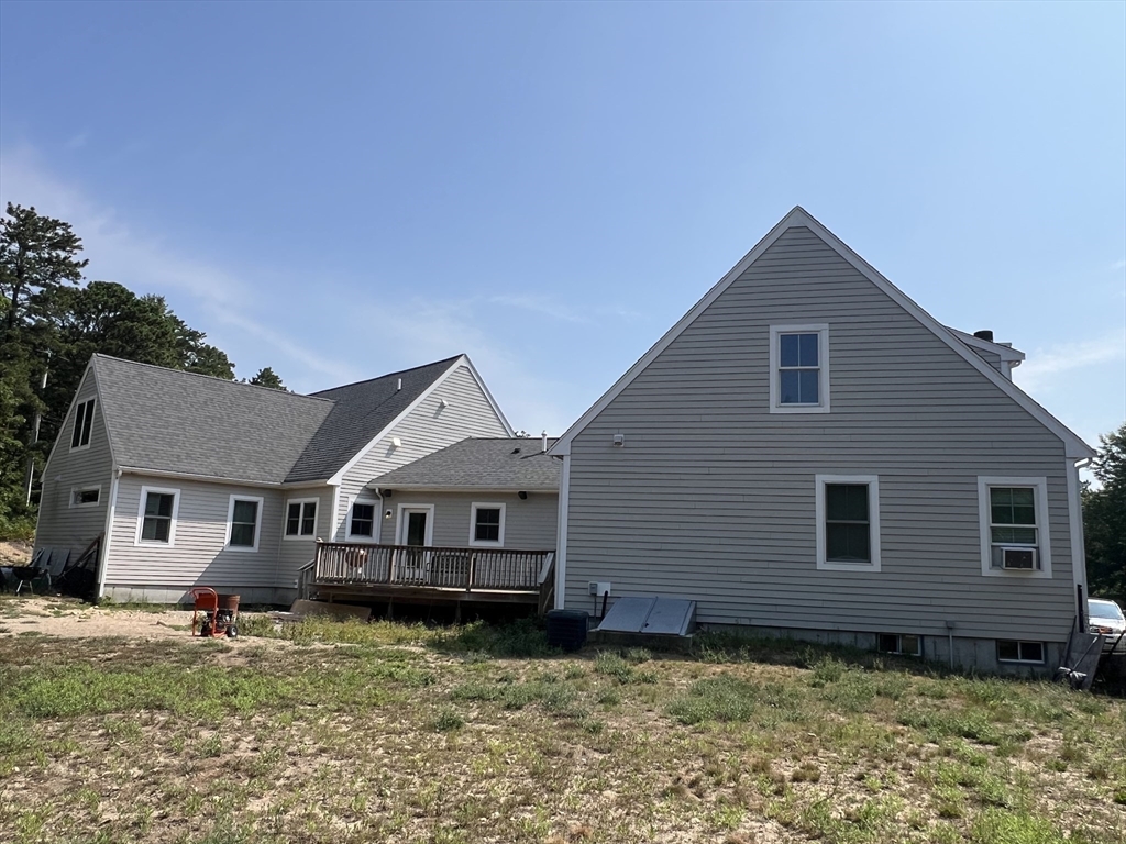 879 Long Pond Road Plymouth, MA 02360 - Photo 2 of 39 a view of a house with a yard
