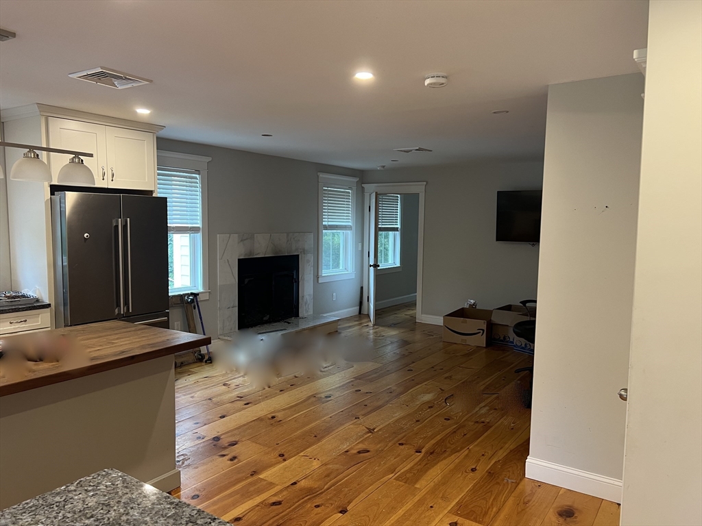 879 Long Pond Road Plymouth, MA 02360 - Photo 24 of 39 a kitchen with a refrigerator and a sink