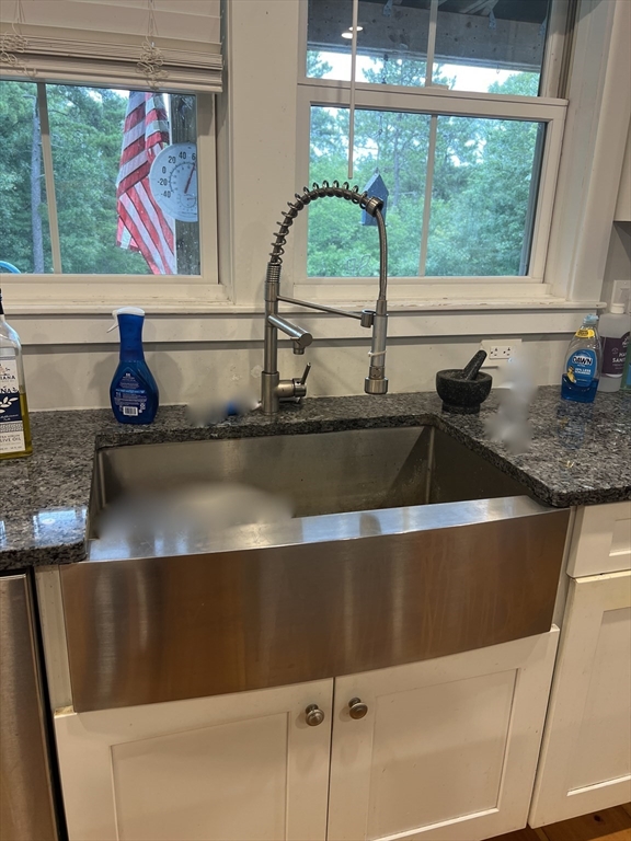 879 Long Pond Road Plymouth, MA 02360 - Photo 27 of 39 a view of a sink a counter top space with a stove