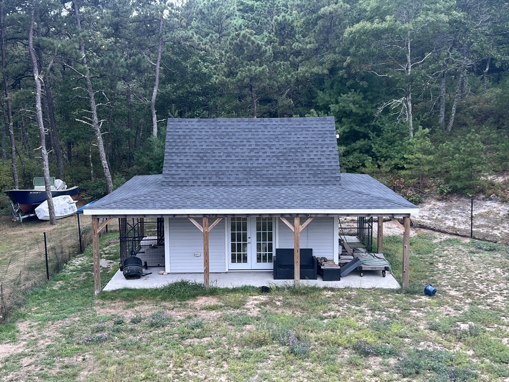 879 Long Pond Road Plymouth, MA 02360 - Photo 33 of 39 a view of a house with a yard plants and large tree