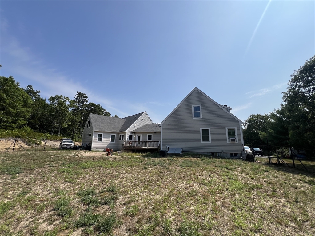879 Long Pond Road Plymouth, MA 02360 - Photo 38 of 39 a house with a yard