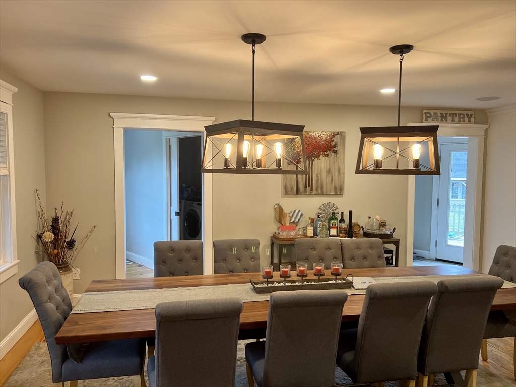 879 Long Pond Road Plymouth, MA 02360 - Photo 5 of 39 a dining room with furniture and window
