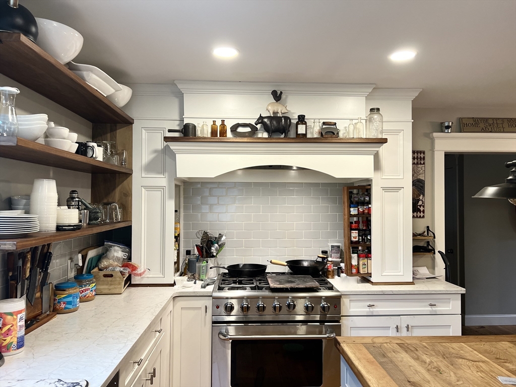 879 Long Pond Road Plymouth, MA 02360 - Photo 6 of 39 a kitchen with stove and cabinets