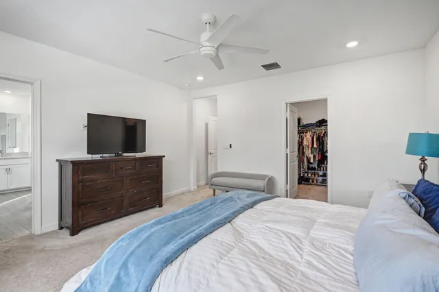 a bathroom with a shower and a sink