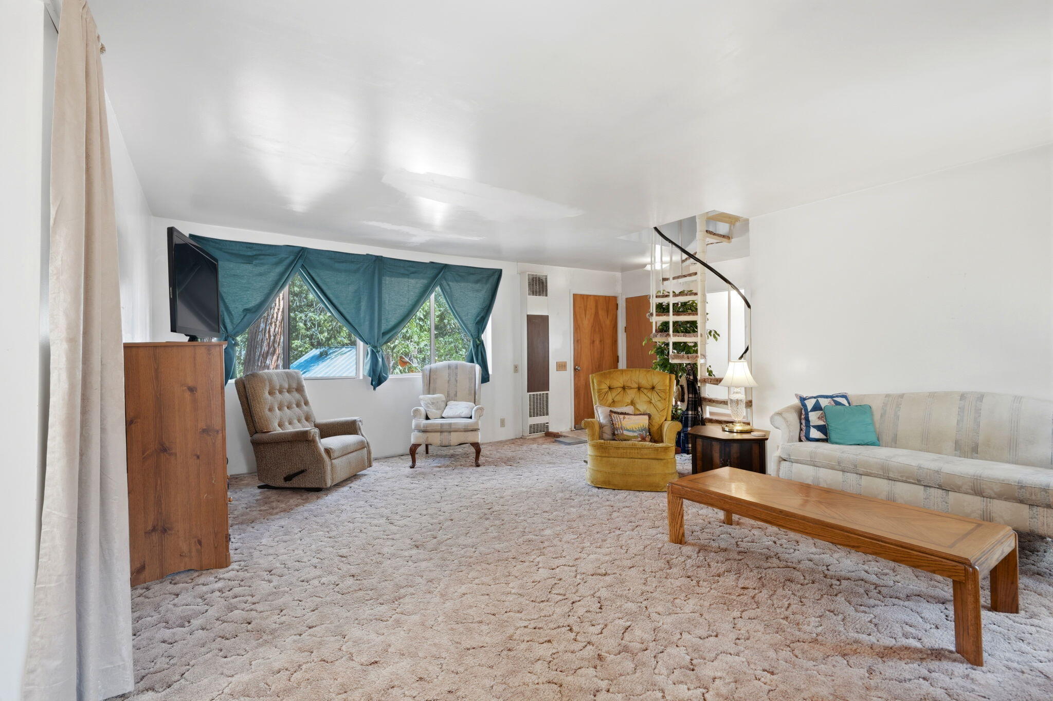 697 Loop Drive Springville, CA 93265 - Photo 12 of 55 a living room with furniture and a large window