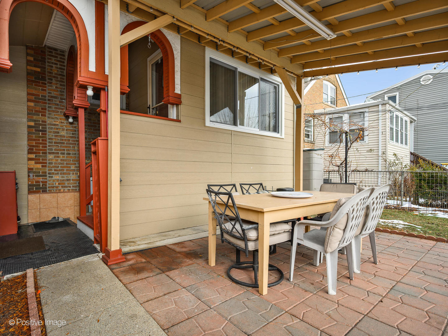 6057 West Melrose Street Chicago, IL 60634 - Photo 31 of 32 a patio with table and chairs